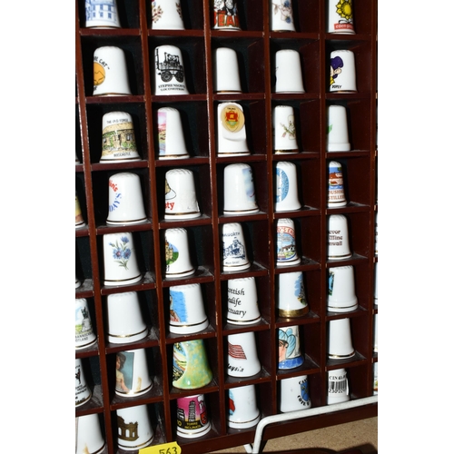 563 - A COLLECTION OF THIMBLES, approximately four hundred and fifty to five hundred, with some wooden dis... 