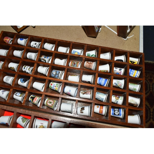 569 - A COLLECTION OF THIMBLES, approximately three hundred and fifty to four hundred, with some wooden di... 