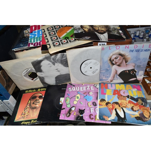 570 - TWO CASES OF SINGLES RECORDS, approximately two hundred singles, by artists to include Duran Duran, ... 