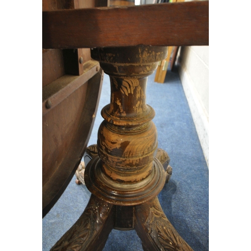 1207 - A 19TH CENTURY WALNUT AND INLAID OVAL TILT TOP LOO TABLE, on a bulbous turned support and four splay... 