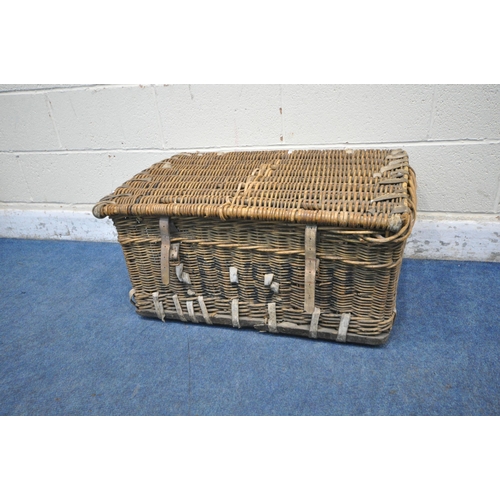 1208 - A WICKER BASKET, with a hinged lid and two closing belts, width 81cm x depth 54cm x height 58cm (con... 