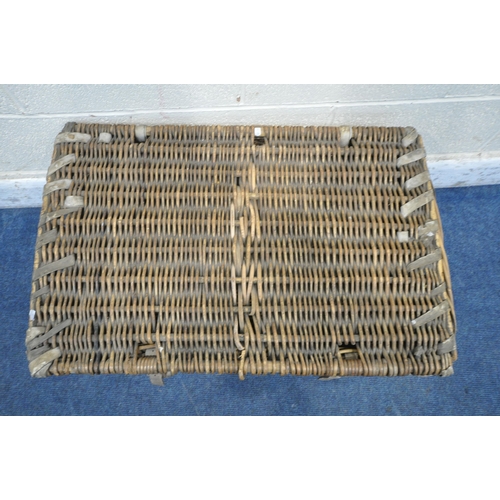 1208 - A WICKER BASKET, with a hinged lid and two closing belts, width 81cm x depth 54cm x height 58cm (con... 