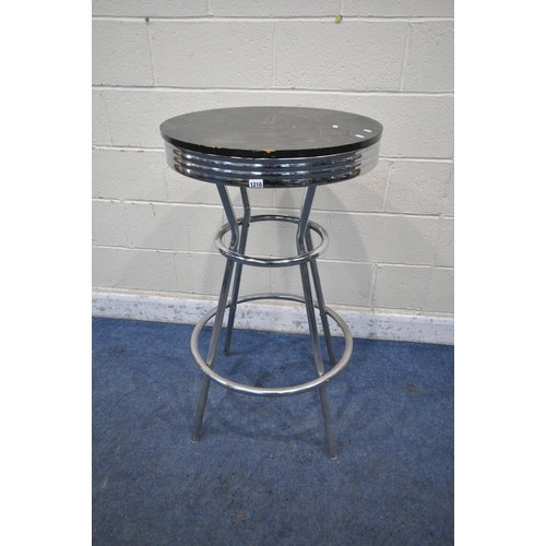 1210 - A MODERN TALL CIRCULAR POSEUR TABLE, with a black painted wooden top, on shaped tubular legs, diamet... 