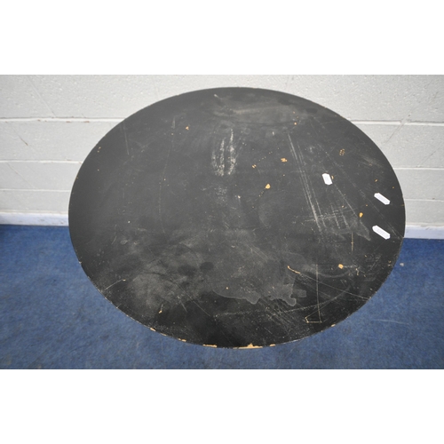 1210 - A MODERN TALL CIRCULAR POSEUR TABLE, with a black painted wooden top, on shaped tubular legs, diamet... 