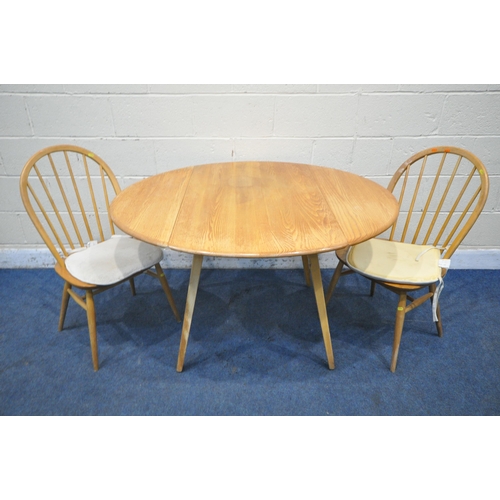 1211 - A MID CENTURY ERCOL ELM AND BEECH DROP LEAF TABLE, on square tapered legs, open width 125cm x closed... 