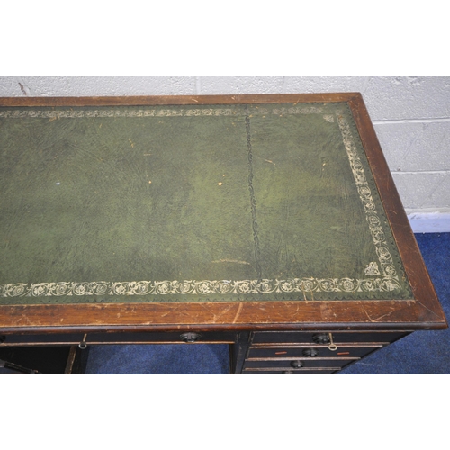 1218 - A 20TH CENTURY MAHOGANY TWIN PEDESTAL DESK, with green tooled leather writing surface, fitted with e... 