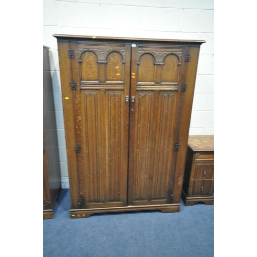 1219 - A 20TH CENTURY OAK THREE PIECE BEDROOM SUITE, comprising a double door wardrobe, width 129cm x depth... 