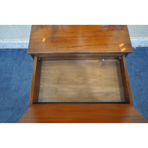 1220 - AN EARLY 20TH CENTURY MAHOGANY DAVENPORT, fitted with a double door top section, enclosing four draw... 