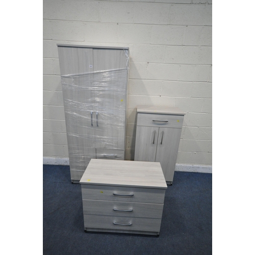 1237 - A MODERN GREY FINISH THREE PIECE BEDROOM SUITE, comprising a double door wardrobe, with three drawer... 