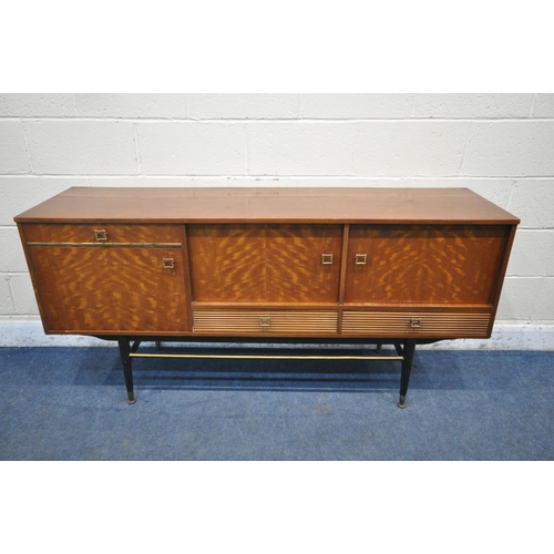 1250 - A MID CENTURY MILWOOD TEAK SIDEBOARD, with an arrangement of three drawers and three cupboard doors,... 