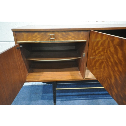 1250 - A MID CENTURY MILWOOD TEAK SIDEBOARD, with an arrangement of three drawers and three cupboard doors,... 