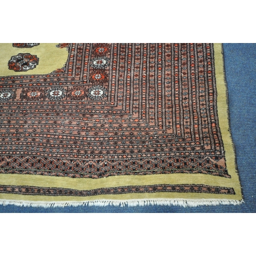 1256 - THREE PATTERNED WOOL RUGS, the largest rug with a repeating border, central medallions with a tan bo... 