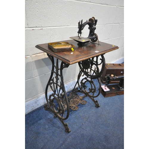 1258 - A VINTAGE WILLCOX AND GIBBS TREADLE SEWING MACHINE, serial number A481848 which appears to come with... 