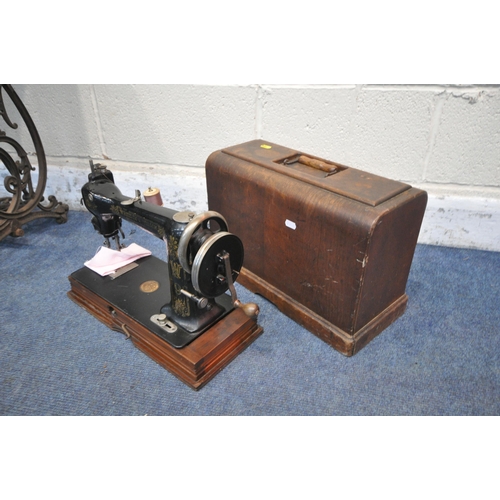 1258 - A VINTAGE WILLCOX AND GIBBS TREADLE SEWING MACHINE, serial number A481848 which appears to come with... 