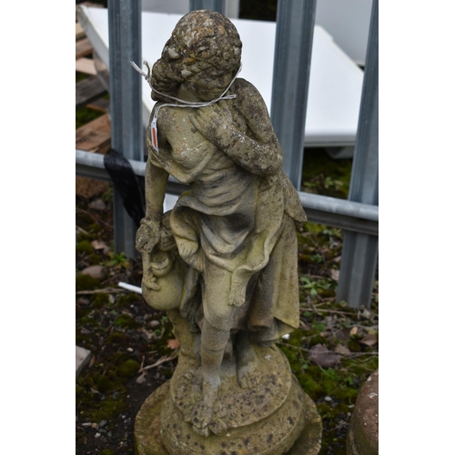 1007 - A WEATHERED COMPOSITE GARDEN FIGURE OF A LADY IN FLOWING ROBES, height 68cm, and a cherub garden fig... 