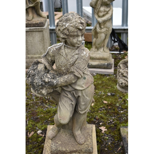 1009 - TWO WEATHERED GARDEN FIGURES, of a boy and girl, max height 75cm (condition report: no cracks or dam... 