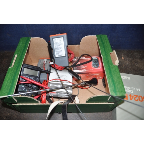 1054 - A TRAY CONTAINING ELECTRICAL TEST EQUIPMENT including a boxed Fluke 8024B multimeter, two Comark 900... 