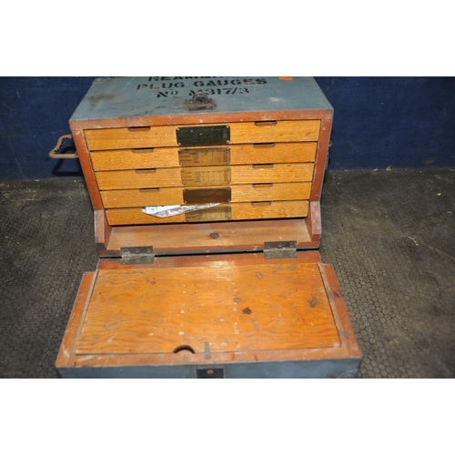 1058 - A MILITARY WOODEN TOOL CHEST marked for Reamers and Plug gauges containing round and square bar, nut... 