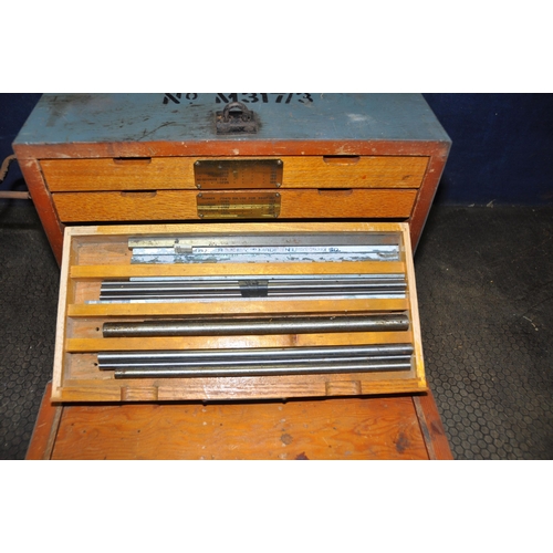 1058 - A MILITARY WOODEN TOOL CHEST marked for Reamers and Plug gauges containing round and square bar, nut... 