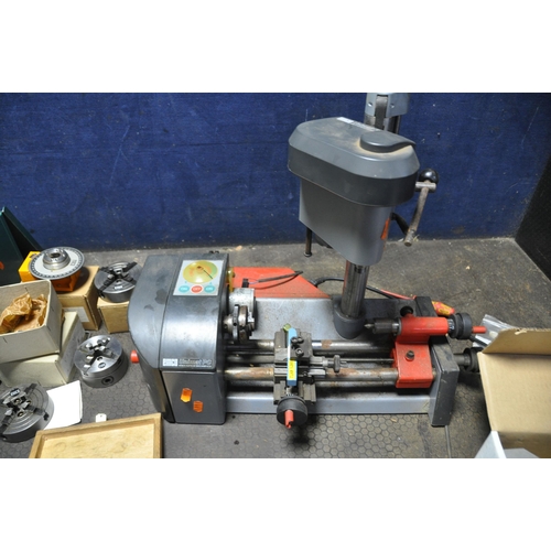 1064 - A EMCO UNIMAT PC MINIATURE LATHE WITH MILLING HEAD total length 54cm, a dividing head, two Emco four... 