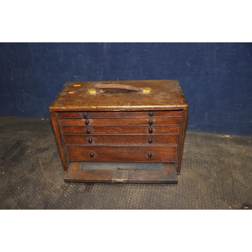 1078 - A VINTAGE WOODEN ENGINEERS TOOLCHEST with lock to front (no key), concealing five graduated drawers ... 