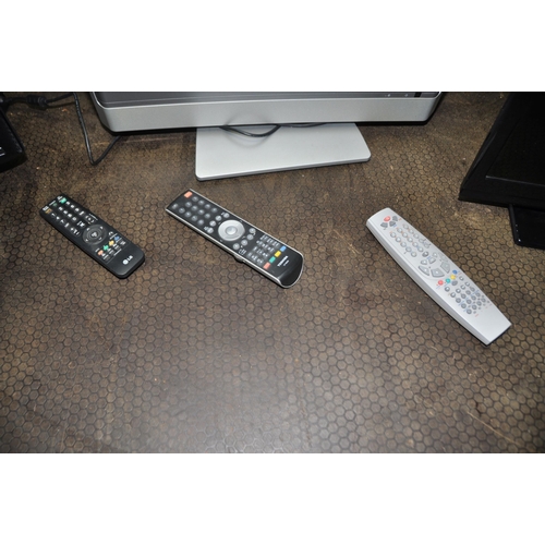 1087 - THREE LCD TVs comprising of a LG 19in with remote, a Toshiba 17in with remote and a Digihome 15in wi... 