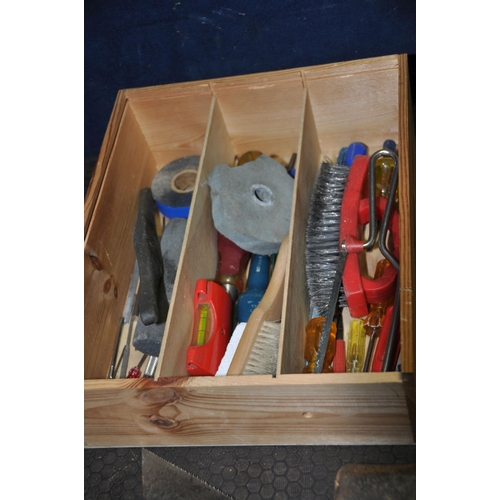 1090 - FOUR WOODEN TRAYS CONTAINING TOOLS including a Woden engineers vice, brace bits, chisels, saws, etc