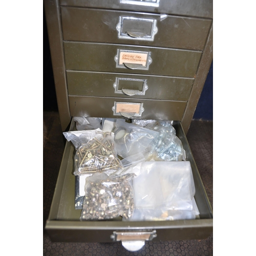 1094 - A VINTAGE METAL CHEST OF TEN FILE DRAWERS containing screws, nuts and bolts, and electrical fixings ... 