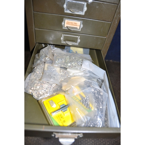 1094 - A VINTAGE METAL CHEST OF TEN FILE DRAWERS containing screws, nuts and bolts, and electrical fixings ... 