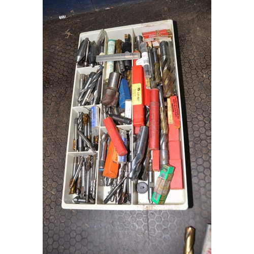 1095 - THREE TRAYS CONTAINING MILLING HEAD CUTTERS including unused still wax sealed end mill bits, T slot ... 