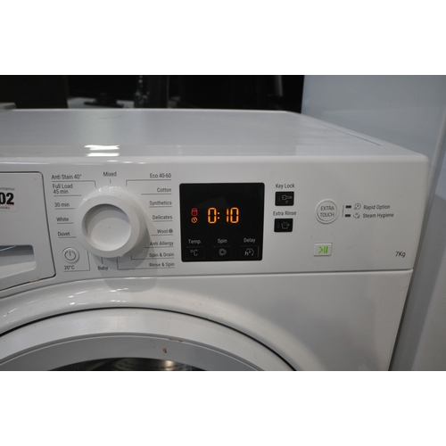 1102 - A HOTPOINT NSWR 742U WK UK N WASHING MACHINE (PAT pass and working)