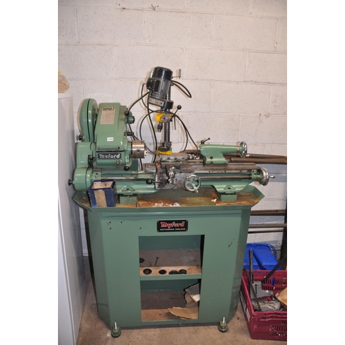 1129 - A MYFORD SUPER 7 METALWORKING LATHE, with 65cm bed, three jaw chuck, an Emco milling head attachment... 