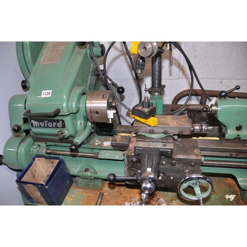 1129 - A MYFORD SUPER 7 METALWORKING LATHE, with 65cm bed, three jaw chuck, an Emco milling head attachment... 