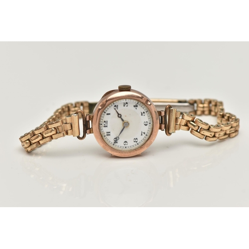 21 - A LADIES 9CT GOLD WRISTWATCH, manual wind, round white dial, Arabic numerals, blue steel hands, in a... 