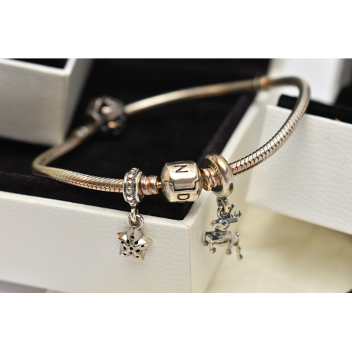 28 - A BOXED 'PANDORA' CHARM BRACELET AND TWO BOXED CHARMS, snake chain bracelet fitted with a signed 'Pa... 