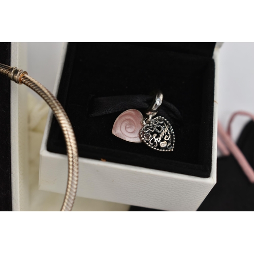 28 - A BOXED 'PANDORA' CHARM BRACELET AND TWO BOXED CHARMS, snake chain bracelet fitted with a signed 'Pa... 