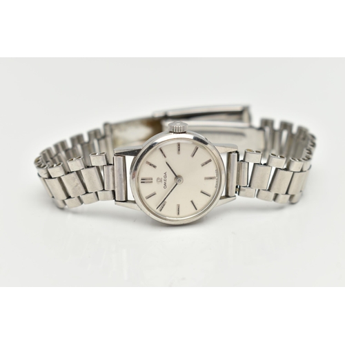 34 - AN OMEGA WRISTWATCH, the silver coloured dial, with black enamel silver coloured hourly applied mark... 