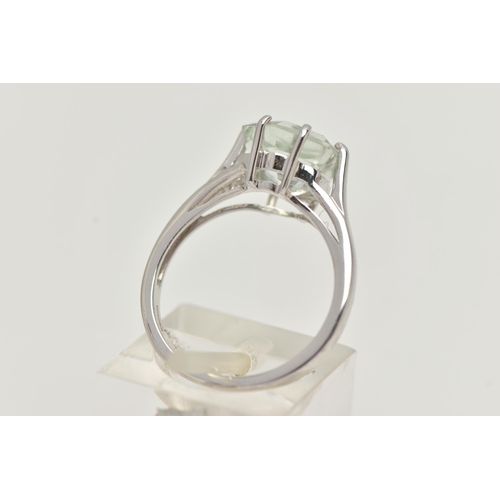 37 - A MODERN 9CT WHITE GOLD BERYL SINGLE STONE RING, set with a hexagonal shaped mixed cut pale green be... 