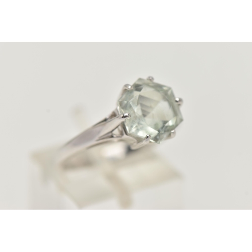 37 - A MODERN 9CT WHITE GOLD BERYL SINGLE STONE RING, set with a hexagonal shaped mixed cut pale green be... 