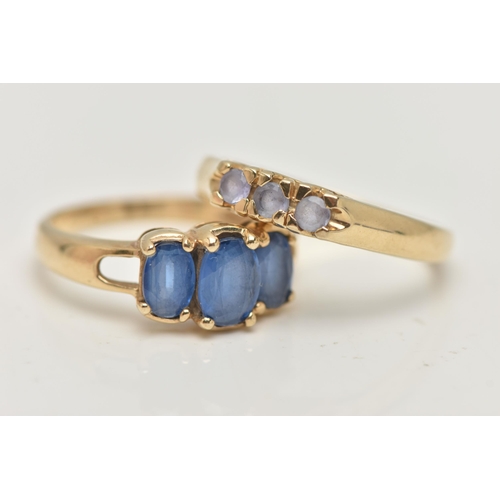 4 - TWO 9CT GOLD GEM SET RINGS, the first designed as a line of three circular cut tanzanite, the second... 