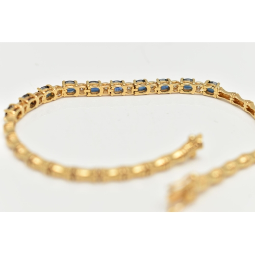 8 - A SAPPHIRE AND DIAMOND BRACELET, designed as a central section of ten oval cut sapphires interspaced... 