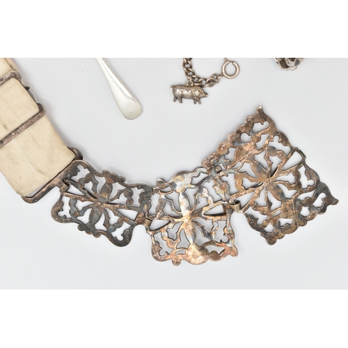 118 - A SELECTION OF JEWELLERY AND AN EPNS NURSES BELT, to include a white metal charm bracelet fitted wit... 