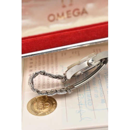 122 - A LADIES 'OMEGA GENEVE' WRISTWATCH WITH BOX AND PAPERS, round silvered dial signed 'Omega, Geneve', ... 