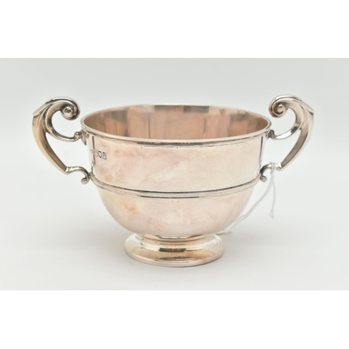 94 - A GEORGE V GOLDSMITHS AND SILVERSMITHS COMPANY LTD SILVER TWIN HANDLED CHRISTENING BOWL, scrolled ha... 