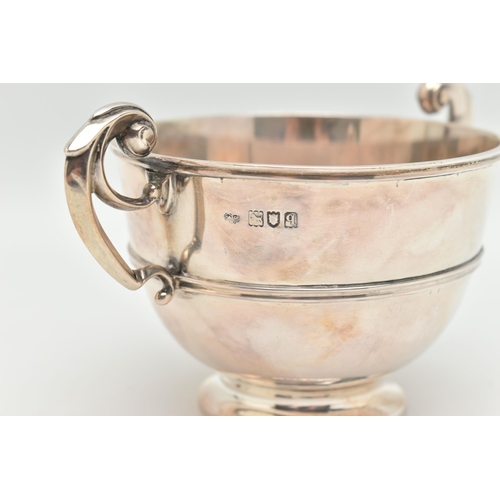 94 - A GEORGE V GOLDSMITHS AND SILVERSMITHS COMPANY LTD SILVER TWIN HANDLED CHRISTENING BOWL, scrolled ha... 