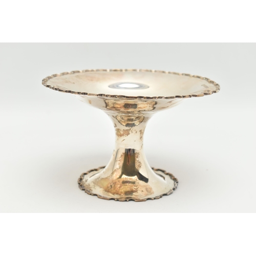 99 - A GEORGE V SILVER PEDESTAL DISH, circular form with wavy rim, tapering raised pedestal on a round ba... 