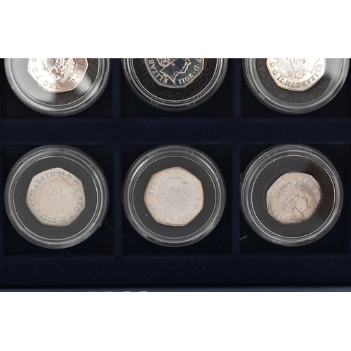 134 - A BOX OF ROYAL MINT COMMEMORATIVE SILVER 50 PENCE COINS, to include eleven coins, from the Olympic '... 