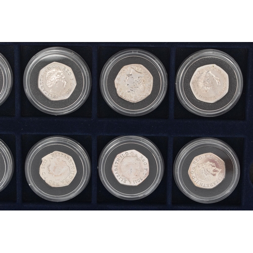 134 - A BOX OF ROYAL MINT COMMEMORATIVE SILVER 50 PENCE COINS, to include eleven coins, from the Olympic '... 