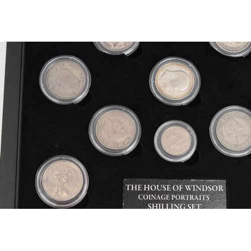 135 - A CASED SET OF COMMEMORATIVE COINS, The House of Windsor coinage portraits shilling set by The Bradf... 