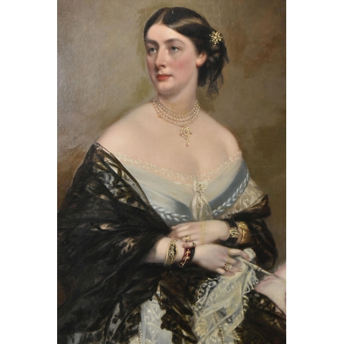 296 - ATTRIBUTED TO RICHARD BUCKNER (BRITISH, 1812-1882) Three quarter length portrait of a lady wearing a... 